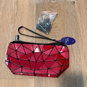 Emilio Pepe red wristlet with detachable cross body strap